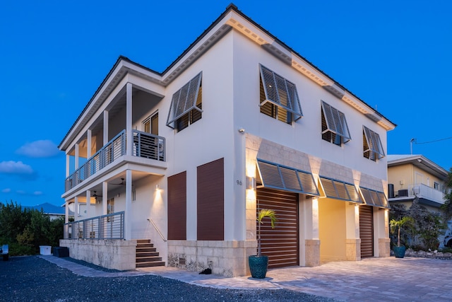 view of property exterior featuring a balcony