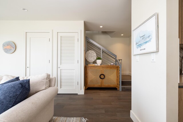 hallway featuring dark hardwood / wood-style floors