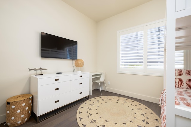 bedroom featuring dark wood-type flooring