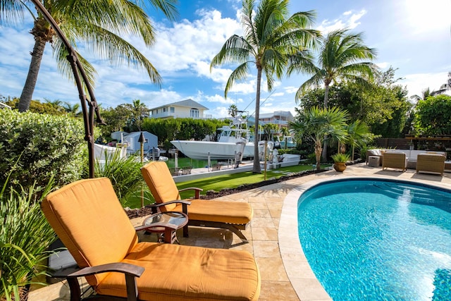 view of pool featuring a patio and outdoor lounge area