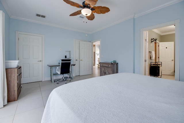 tiled bedroom with ornamental molding and ceiling fan