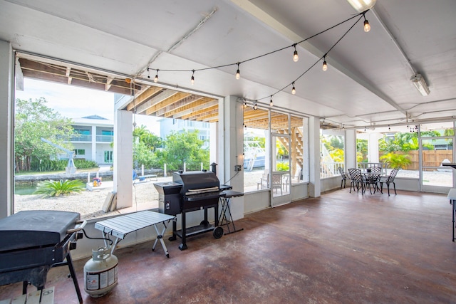 sunroom featuring a healthy amount of sunlight