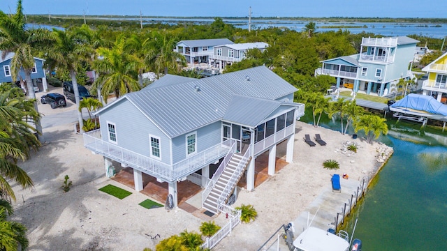 aerial view featuring a water view