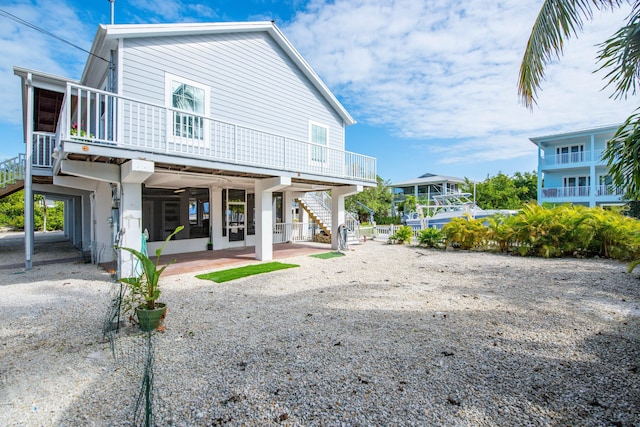 rear view of property with a patio area