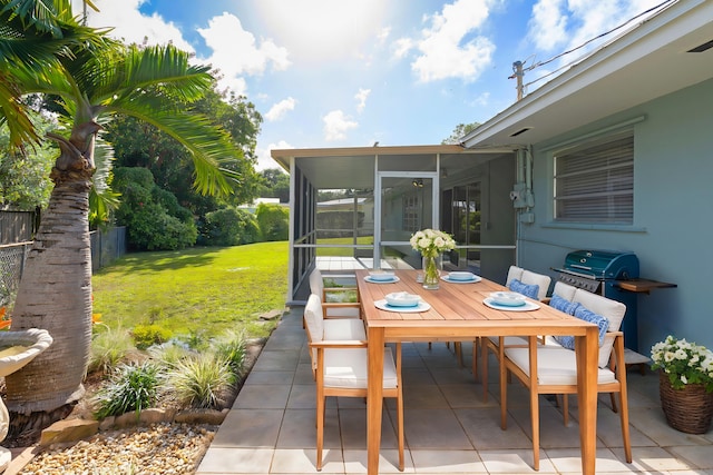 view of patio / terrace with a sunroom