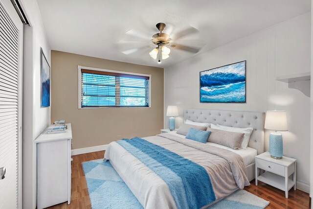 bedroom featuring hardwood / wood-style flooring and ceiling fan