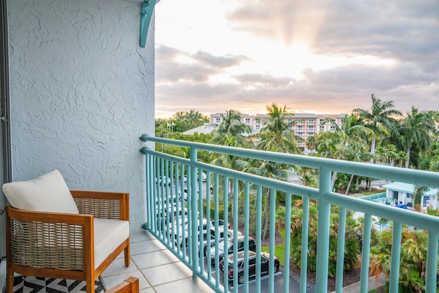 view of balcony at dusk