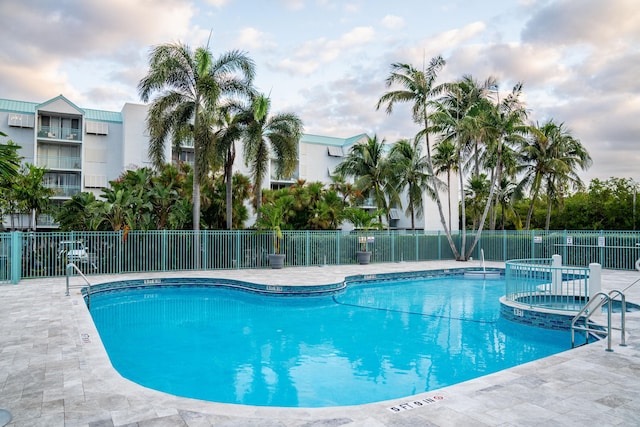 view of pool with a community hot tub