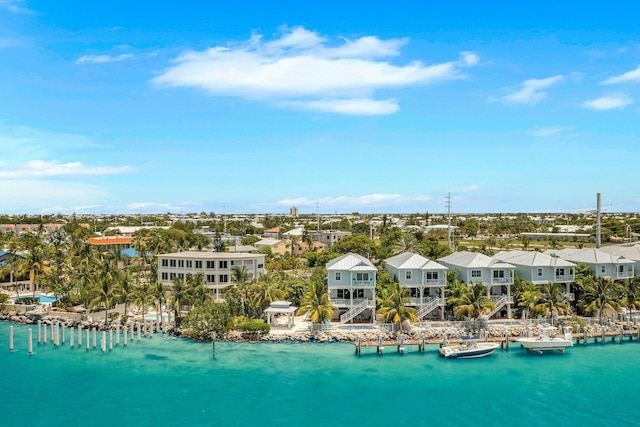 aerial view featuring a residential view and a water view