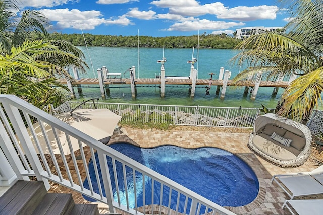 balcony featuring a water view, a dock, and a patio