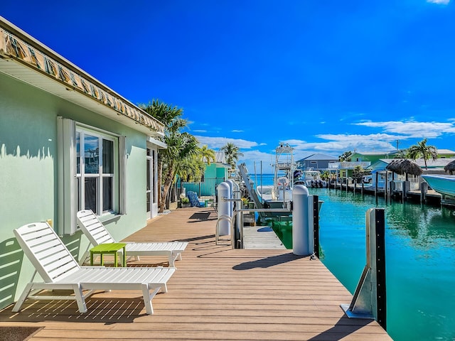 view of dock with a water view