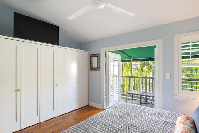 bedroom with ceiling fan, lofted ceiling, access to exterior, and light hardwood / wood-style floors