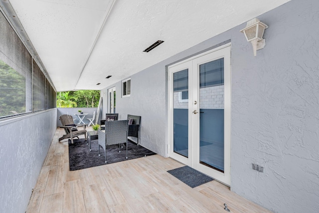 15 Garden Cove Dr, Key Largo, FL 33037 - wooden deck featuring french doors