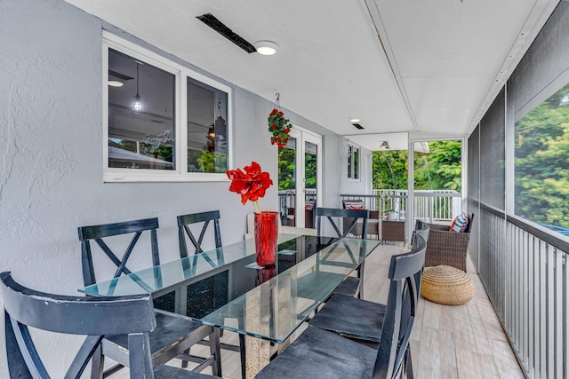 15 Garden Cove Dr, Key Largo, FL 33037 - sunroom featuring outdoor dining area and french doors