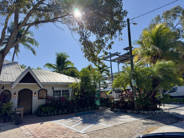15 Garden Cove Dr, Key Largo, FL 33037 - view of front of home featuring a standing seam roof and metal roof