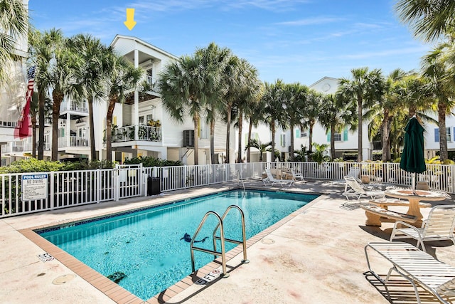 view of swimming pool with a patio area