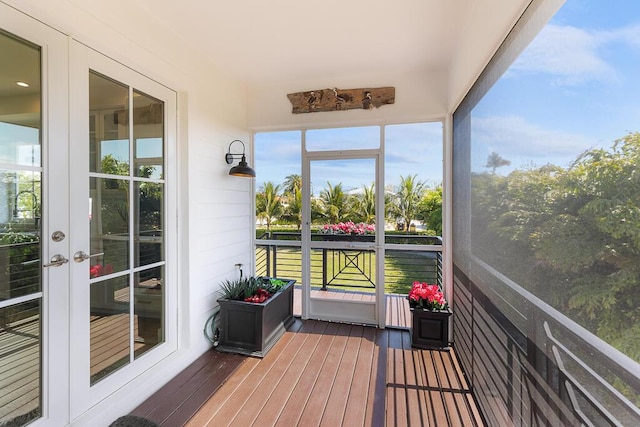sunroom featuring french doors