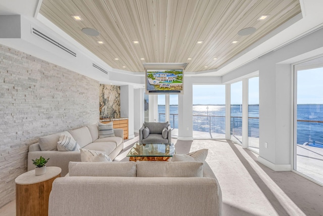 living room featuring plenty of natural light and wooden ceiling