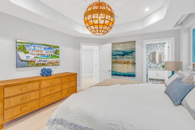 bedroom with a raised ceiling