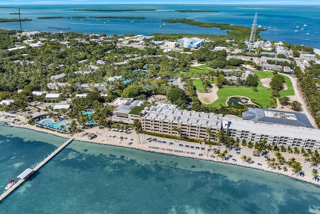 bird's eye view featuring a view of the beach and a water view