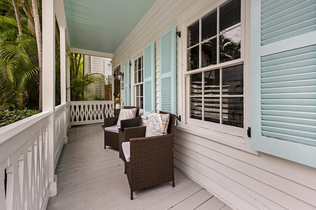 wooden terrace with covered porch