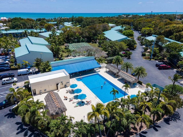 birds eye view of property featuring a water view