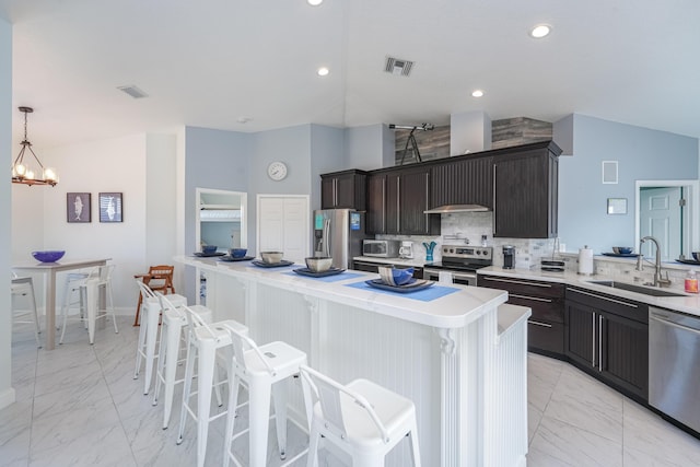 kitchen featuring visible vents, stainless steel appliances, marble finish floor, and a sink