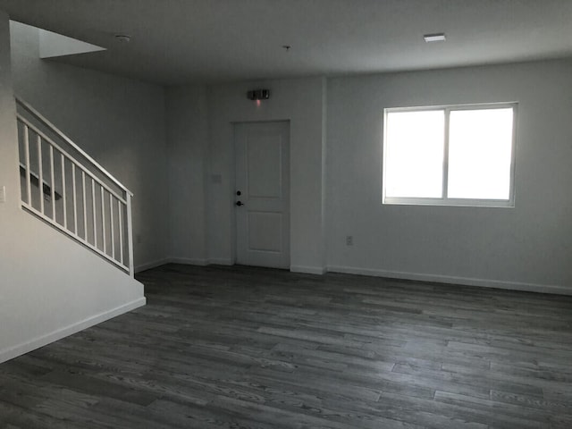 10877 Overseas Hwy Unit 85, Marathon, FL 33050 - entryway with stairway, baseboards, and dark wood finished floors