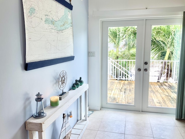 doorway featuring french doors, light tile patterned floors, and a wealth of natural light