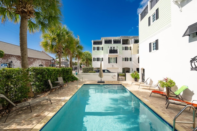 view of pool featuring a patio