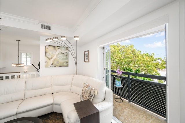 living room featuring crown molding