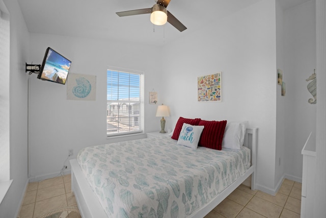 bedroom featuring ceiling fan and light tile patterned floors