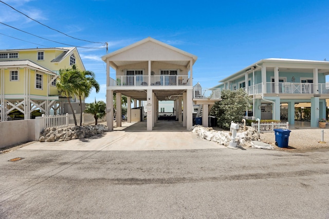 view of front of property featuring a carport and a porch