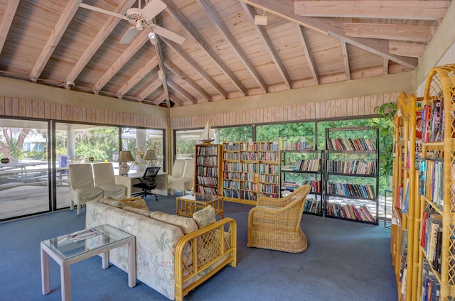 interior space with wood ceiling, lofted ceiling with beams, and a ceiling fan