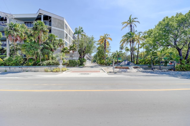 view of road featuring curbs and sidewalks