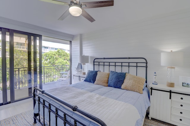 bedroom featuring light tile patterned flooring, a ceiling fan, and access to outside