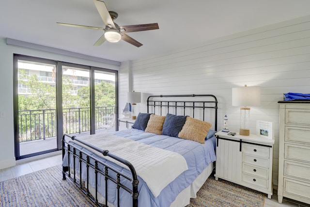 bedroom with light tile patterned floors, a ceiling fan, and access to outside