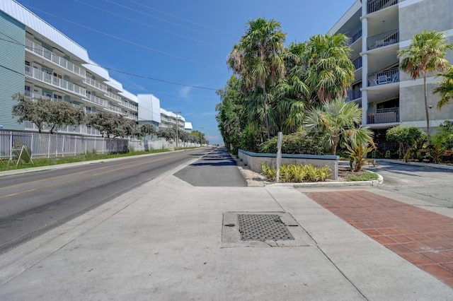 view of street featuring curbs and sidewalks