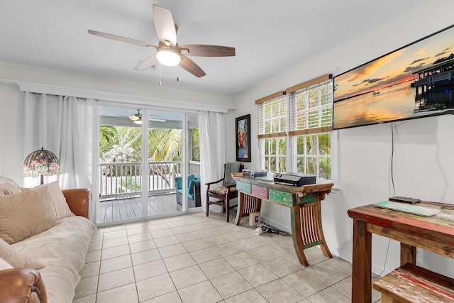 home office with ceiling fan and light tile patterned flooring