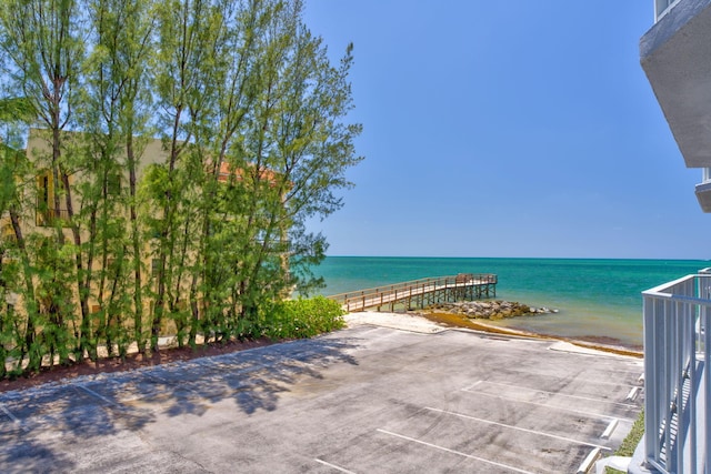 201 E Ocean Dr Unit 211, Key Colony, FL 33051 - view of patio with a water view