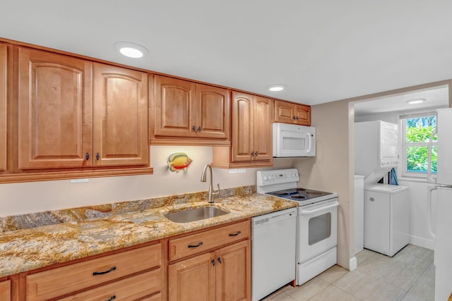 201 E Ocean Dr Unit 211, Key Colony, FL 33051 - kitchen featuring white appliances, a sink, light stone countertops, and light tile patterned floors