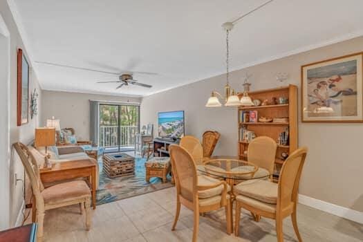 201 E Ocean Dr Unit 211, Key Colony, FL 33051 - dining area with a ceiling fan