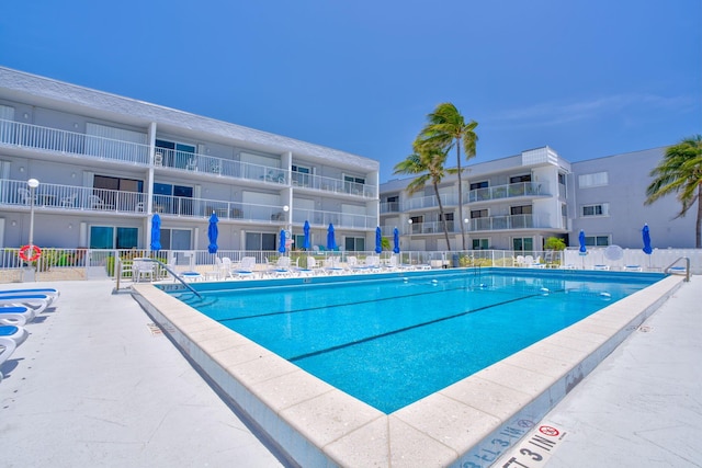 201 E Ocean Dr Unit 211, Key Colony, FL 33051 - community pool with a patio area