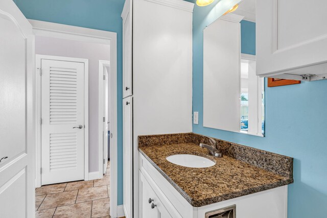 bathroom with vanity and tile patterned floors