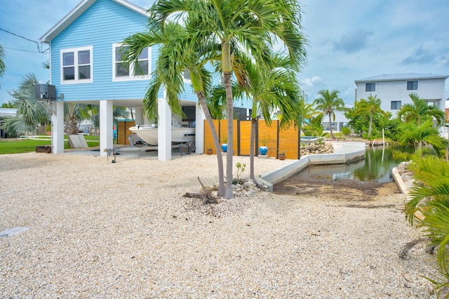 view of yard featuring a carport