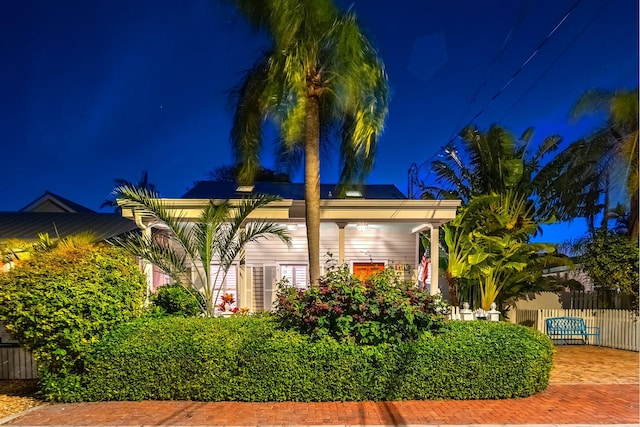 view of property exterior at twilight