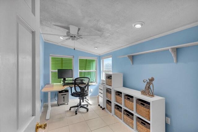 home office with crown molding, ceiling fan, a textured ceiling, and light tile patterned floors