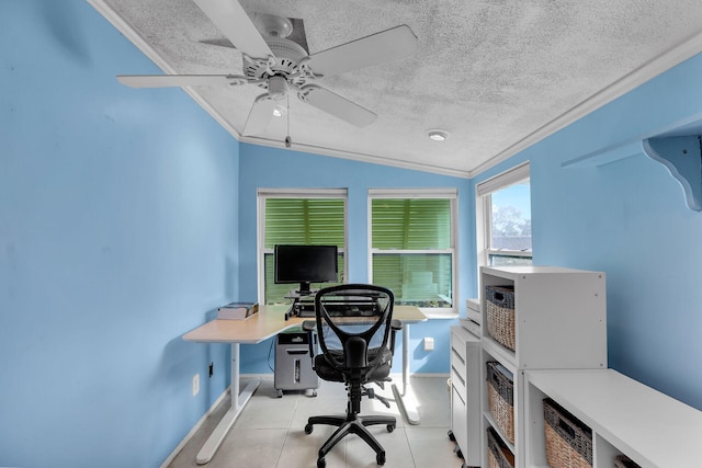 office space featuring ornamental molding, vaulted ceiling, ceiling fan, and a textured ceiling