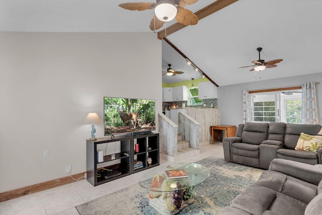 tiled living room with beamed ceiling and high vaulted ceiling