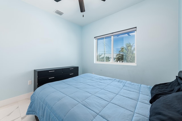 bedroom with marble finish floor, baseboards, a ceiling fan, and visible vents